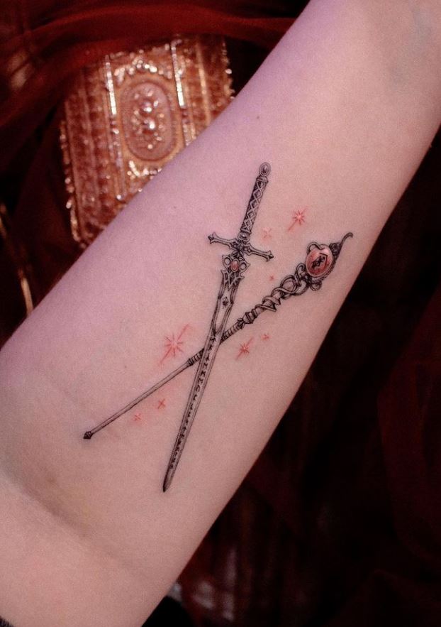 Magical Sword And Staff Tattoo