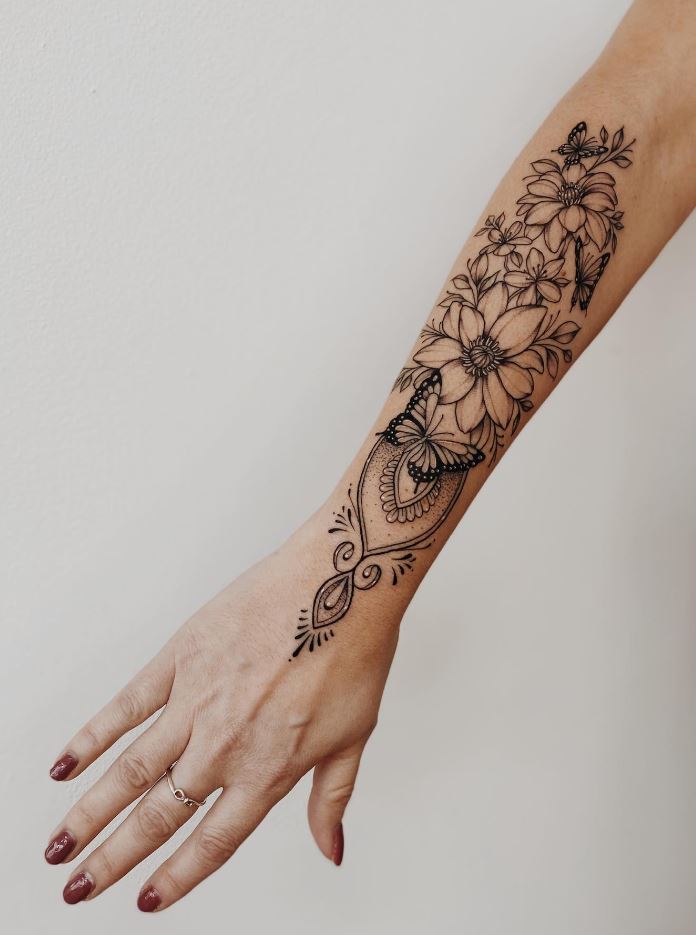 Arm Flowers Tattoo | InkStyleMag